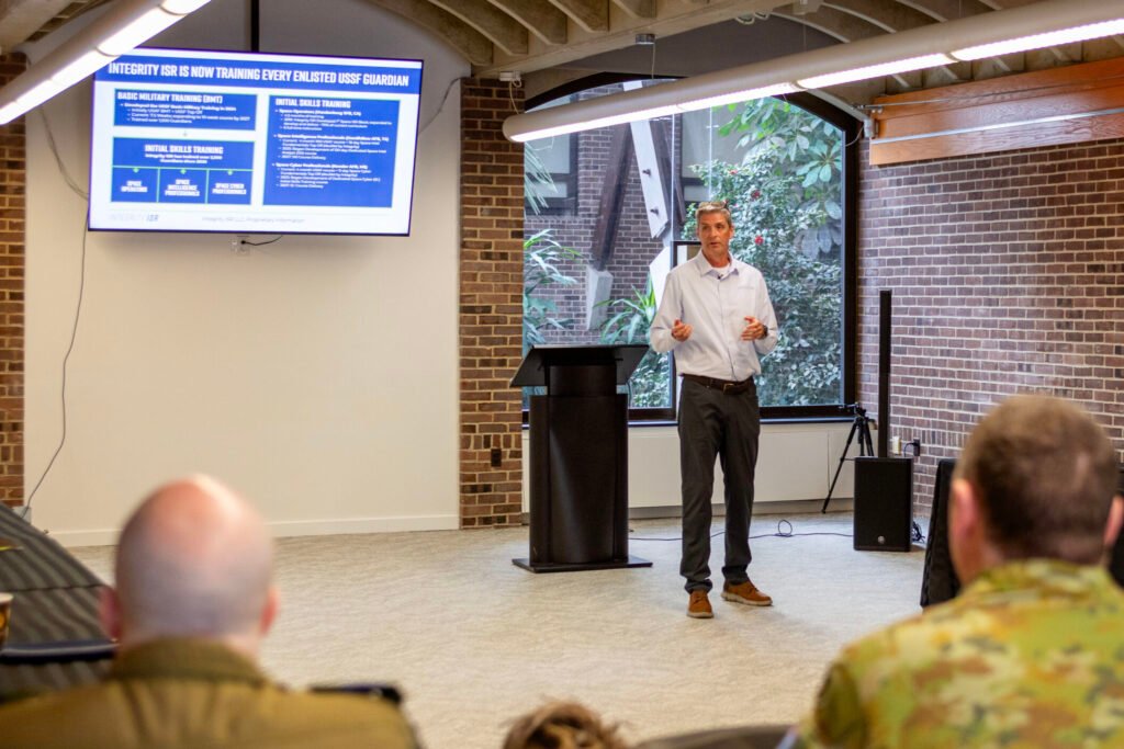 Man from Integrity ISR teaches room of international space professionals
